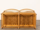 a pair of wooden benches with wicker baskets on them