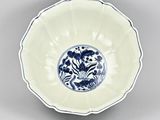 bowl with a blue and white floral design on the rim