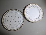 two plates that are sitting next to each other on a table