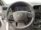 dashboard of a car with a steering wheel and dashboard gauges