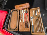 many tools in the trunk of a car