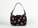 a black purse with a floral design on it