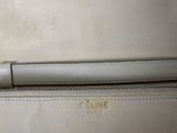 the inside of a white purse with a zipper on it