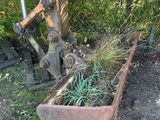 une jardinière posée au sol