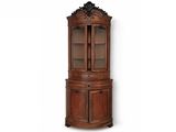 une armoire d'angle en bois avec une porte vitrée et deux tiroirs