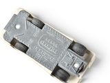 an image of a close up of a metal object on a white surface