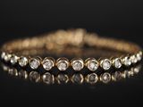 Bracelet tennis en or jaune 14 carats serti de diamants