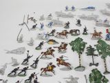 a lot of toy soldiers that are on the table