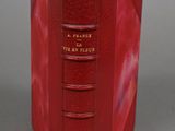 the red book is open to show the inside of it
