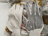 a pile of gloves that are sitting on a table
