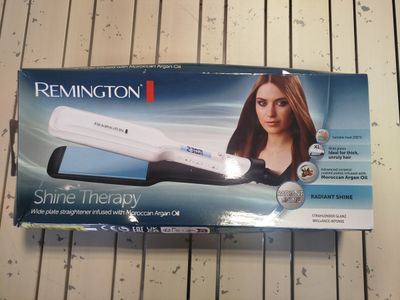 fer à lisser de marque REMINGTON - Photo 1