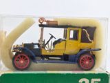 a yellow and blue toy car in a clear box