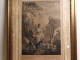 an old picture of a woman and child in a wooded setting