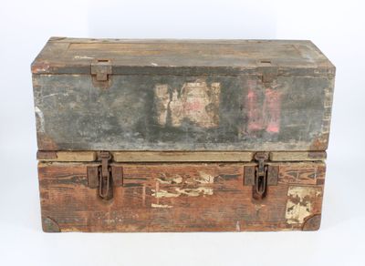 an old wooden trunk with a metal latch on it