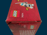 a box of legos sitting on a blue surface