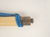 a yellow tube with a blue rope around it