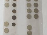a lot of coins that are on the table