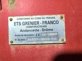 a sign on the door of a train that reads ets grenier franco