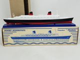 a toy model of a cruise ship in a box