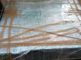 the mattress is wrapped up and ready to be shipped in the warehouse