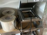 a machine that is sitting on a shelf in a room