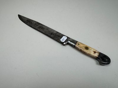 a knife that is sitting on a table