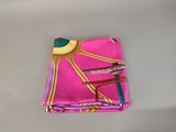 purple and pink pocketed cloth with a design of a horse