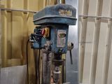 a machine that is sitting inside of a building