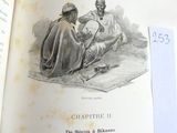 un livre ouvert sur lequel figure le dessin d'un homme et d'une femme assis sur un tapis