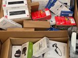 many boxes of electronic devices in a store