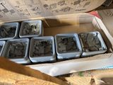 a box full of plastic containers that are sitting on a table