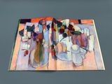 a picture of a book with a painting on it