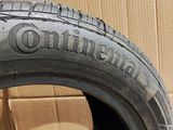 the tire of a motorcycle is sitting on a cardboard box