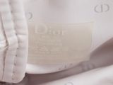 a close up of a white shirt with a label on it