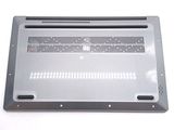 a close up of a silver laptop computer on a white surface