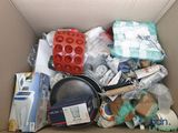 a cardboard box filled with various items that are in it
