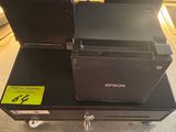two boxes that are sitting on top of a table