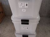 three boxes stacked on top of each other on the floor