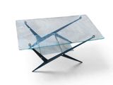 a glass table with a metal base and a glass top