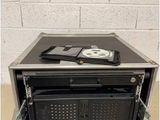 a black case with a cd player inside of it