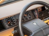 dashboard of a car with a steering wheel and dashboard gauges