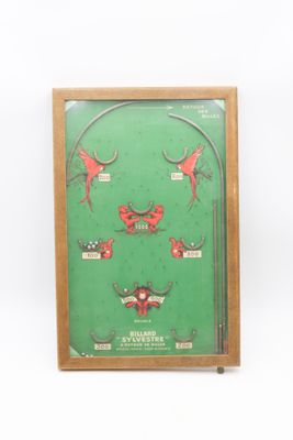 a picture of a picture of a pinball game in a wooden frame