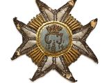 une image d'une étoile surmontée d'une couronne