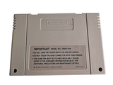 a close up of a gameboy game on a white surface