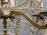 a chandelier that has a bunch of crystal beads hanging from it
