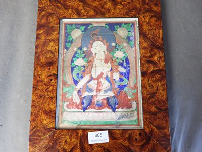 une vieille photo représentant une peinture d'un Bouddha dans un cadre en bois