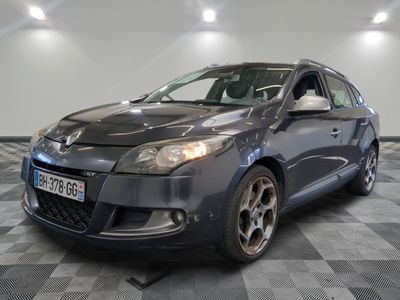 a picture of a car that is parked in a garage