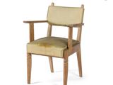 an image of a wooden chair with a green upholstered seat