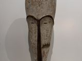 sculpture of a man ' s head with a long nose and a long nose