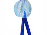 a blue glass object with a blue ribbon on it